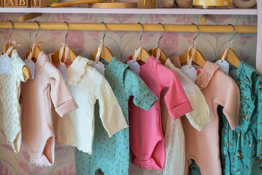 Baby clothes hanging on a rack
